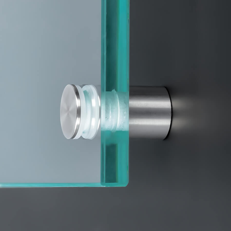 Glashalter schraubbar VA  Ø:15mm  montiert mit einer Scheibe an dunkler Wand