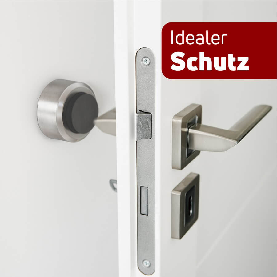 Türstopper Edelstahl Türklinke Wand zum Schrauben Ø30mm Gummi Schwarz Anwendungsbeispiel in heller Umgebung