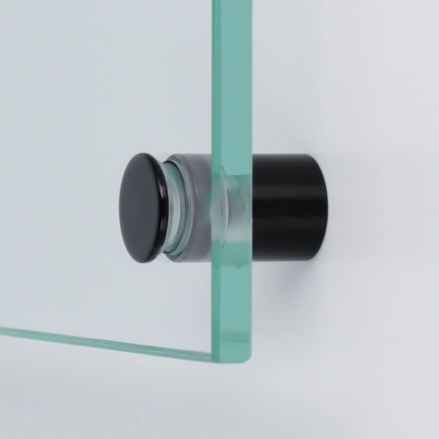 Edelstahl Abstandshalter V2A Ø 15  mm Schwarz montiert mit einer Scheibe an weißer Wand