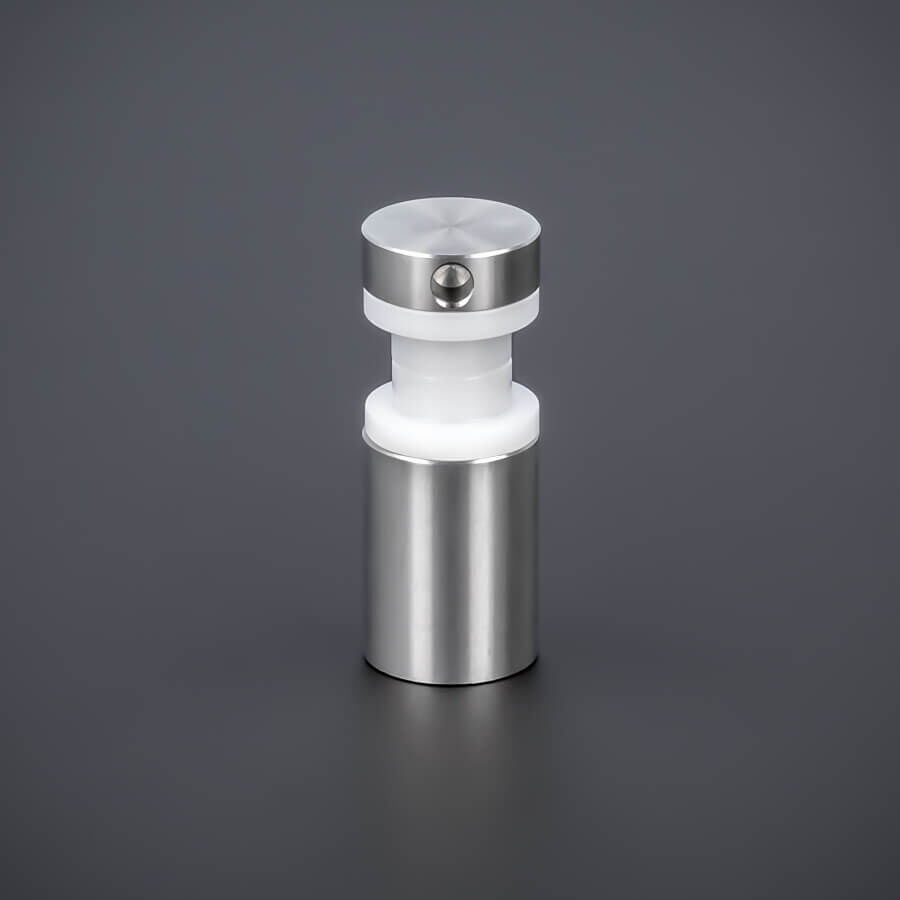 Sandwichabstandhalter V2A Ø15x20mm stehend auf dunklem Untergrund