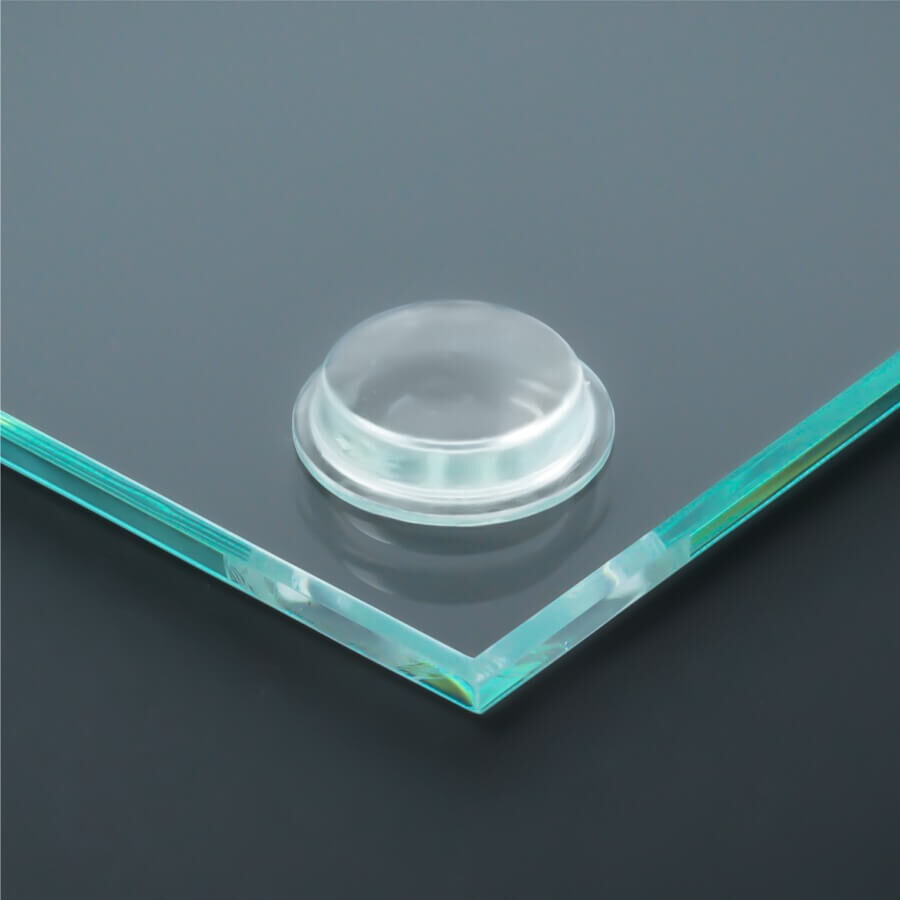 Anschlagpuffer Ø19x4mm selbstklebend montiert auf transparenter Scheibe