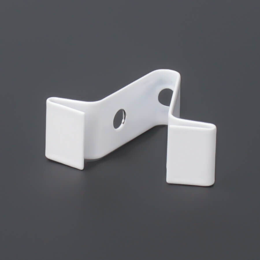 Deckenklemme Deckenclip liegend auf dunklem Untergrund
