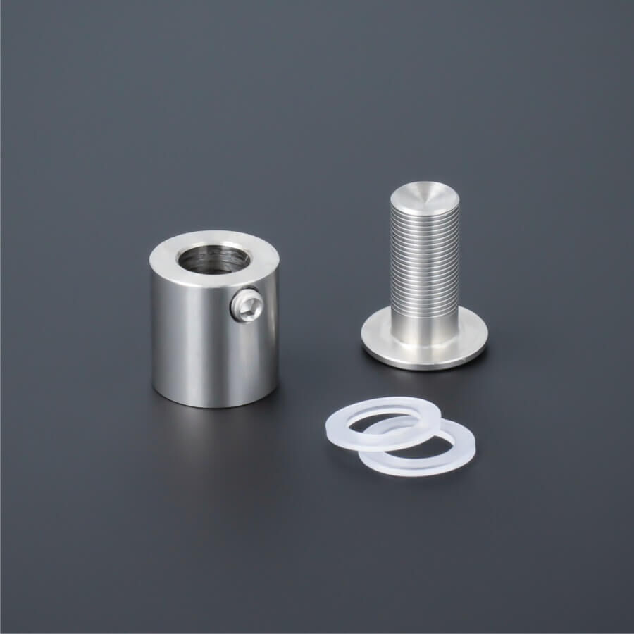 Edelstahl Abstandshalter V2A Ø 15  mm WA: 15 mm PS: 3-12 mm demontiert auf dunklem Untergrund