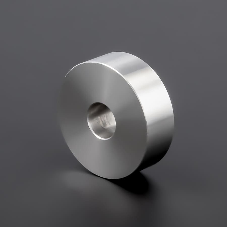 Distanzscheibe M8 | M10 Distanzstück Edelstahl Ø30x10mm liegend auf stehend gedreht Untergrund