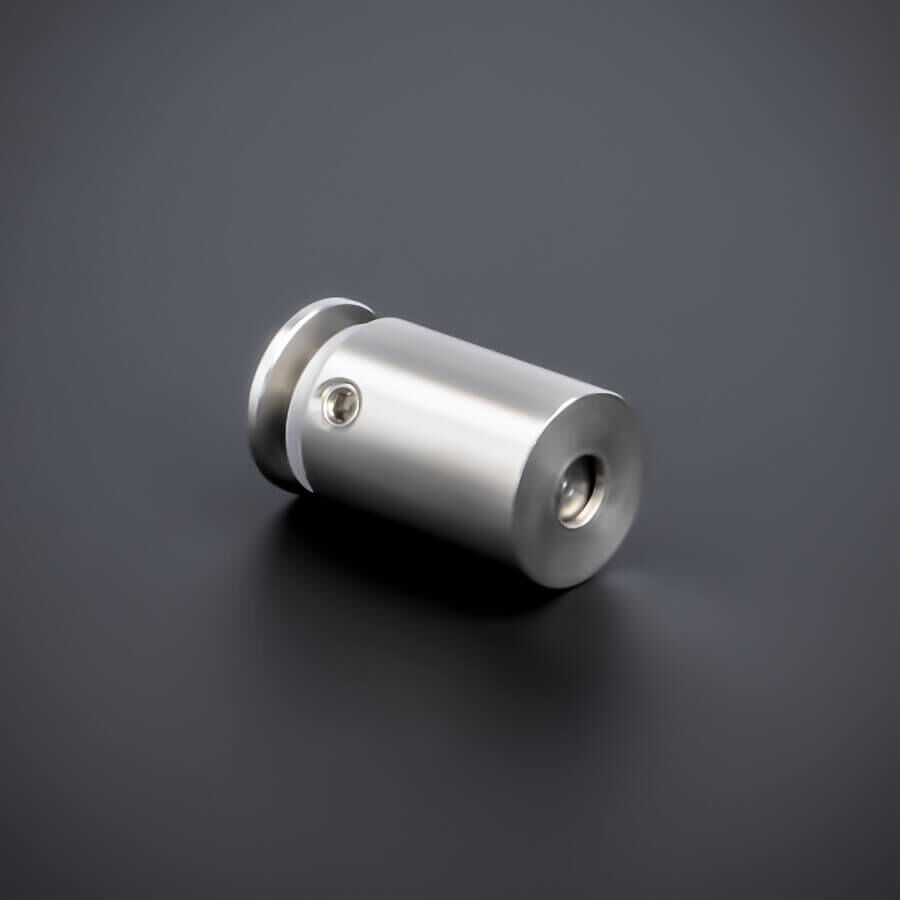 Abstandshalter rund Edelstahl V2A Ø 15 mm liegend auf dunklem Untergrund