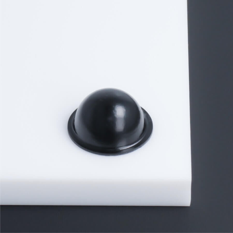 Wand-Puffer Ø 19 mm selbstklebend schwarz klebend auf weißer Platte