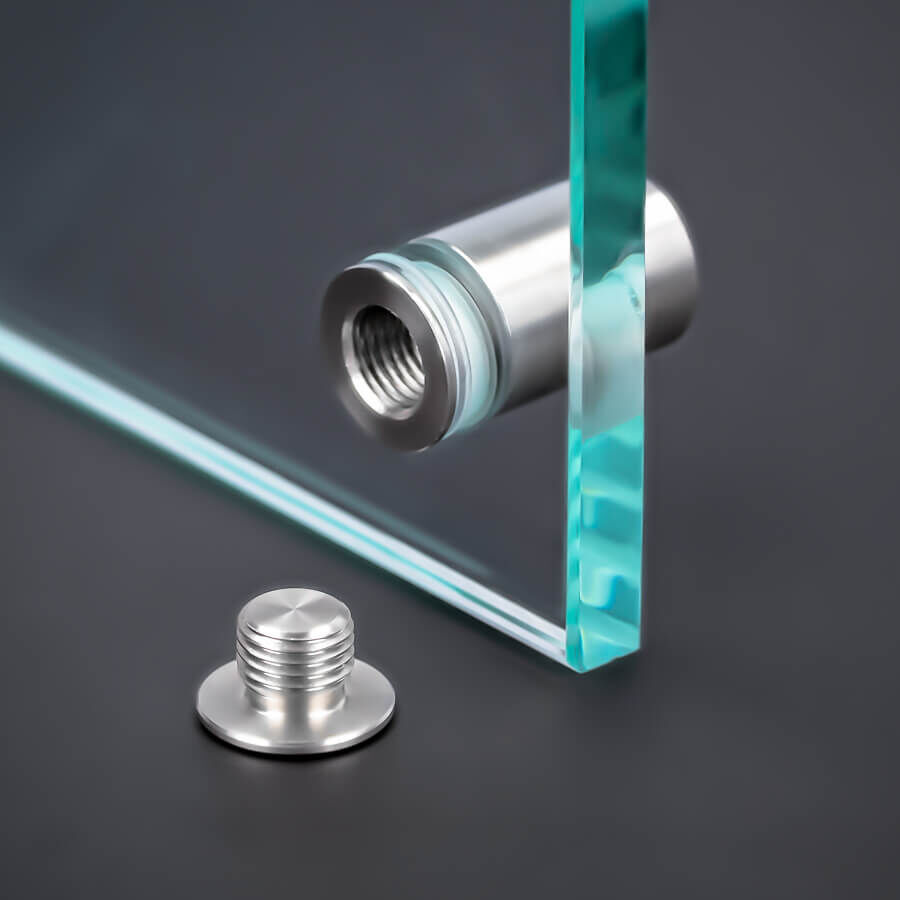 Abstandshalter V2A vormontierbar schraubbar montiert an dunkler Wand