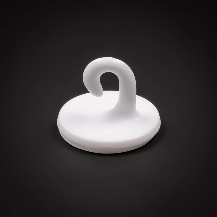Haken selbstklebend 21 mm | Kunststoff | Haken | Dekohaken bis 200 g stehend auf dunklem Untergrund