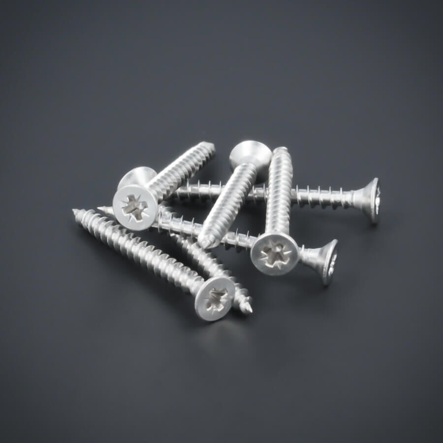 200 x Schraube 3x30 mm Edelstahl V2A - A2 Senkkopf verstärkt Kreuz größere Stückzahl liegend auf dunklem Untergrund