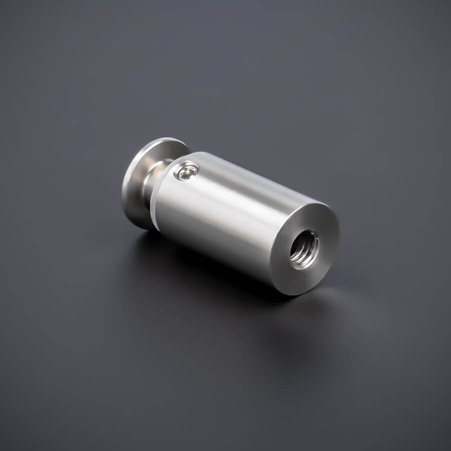 Abstandhalter Werbeschild-Befestigung V2A Ø 15 mm liegend auf dunklem Untergrund