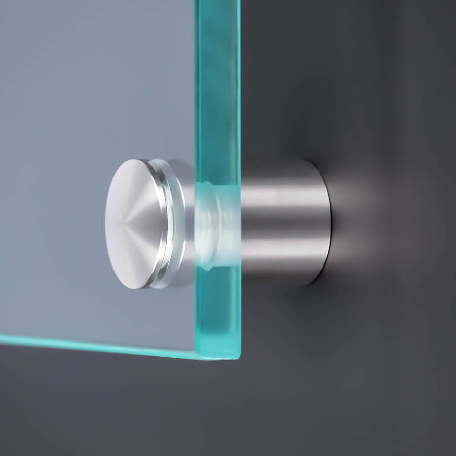 Schilderhalterung Edelstahl VA roh Ø 20mm montiert mit einer Scheibe an einer dunklen Wand